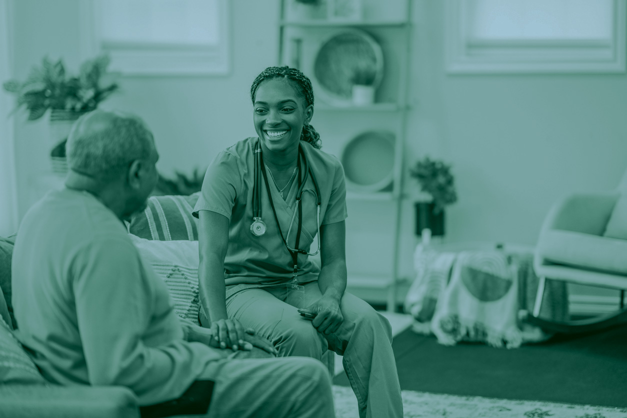 Nurse Comforting Senior Man