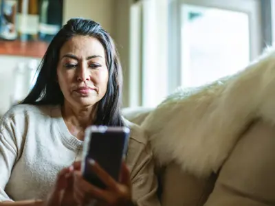 Woman getting update from phone